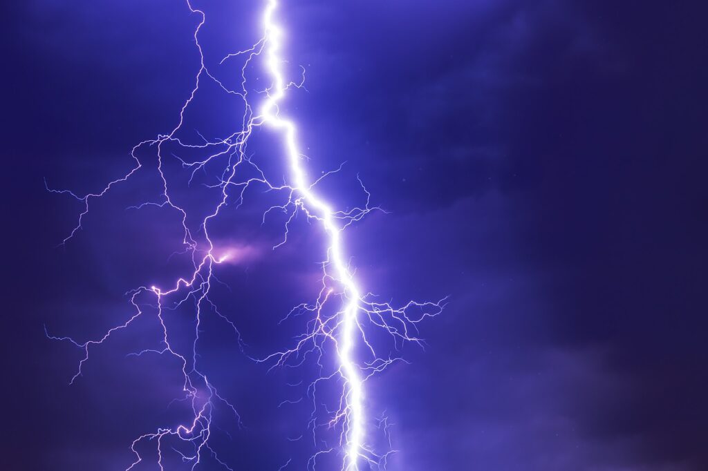 lightning strike on darked purple sky