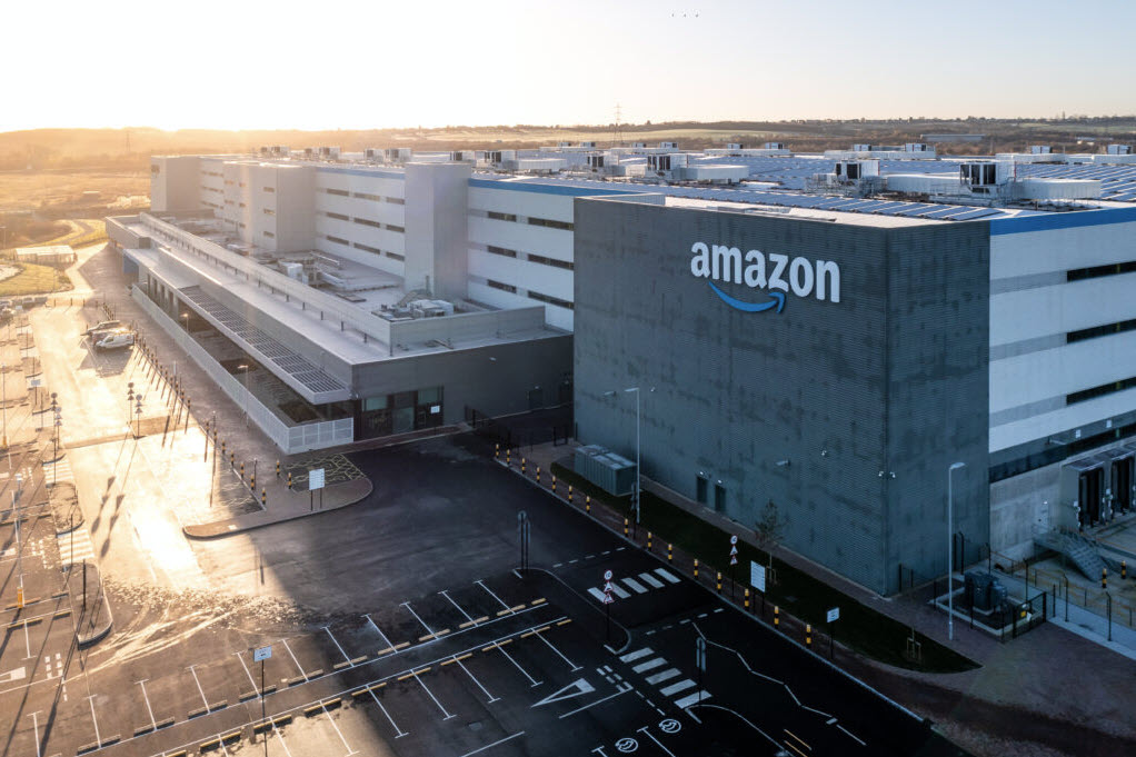 Amazon warehouse at sunset