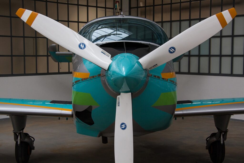 image of small single engine aircraft taken from the front showing propeller