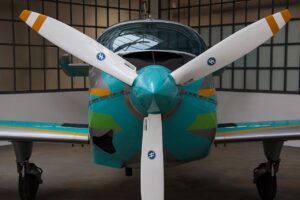 image of small single engine aircraft taken from the front showing propeller